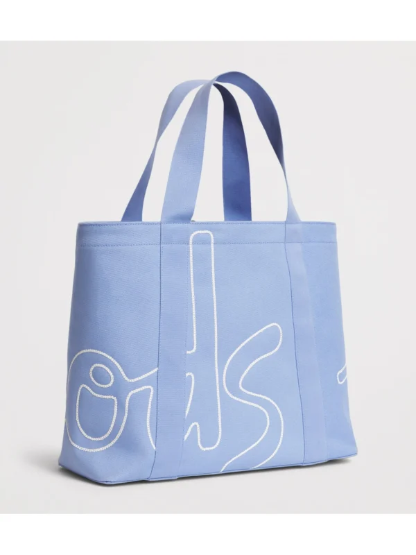 英國直購 Harrods 粉藍色沙灘包側面，15 × 40 × 33 公分黃金比例